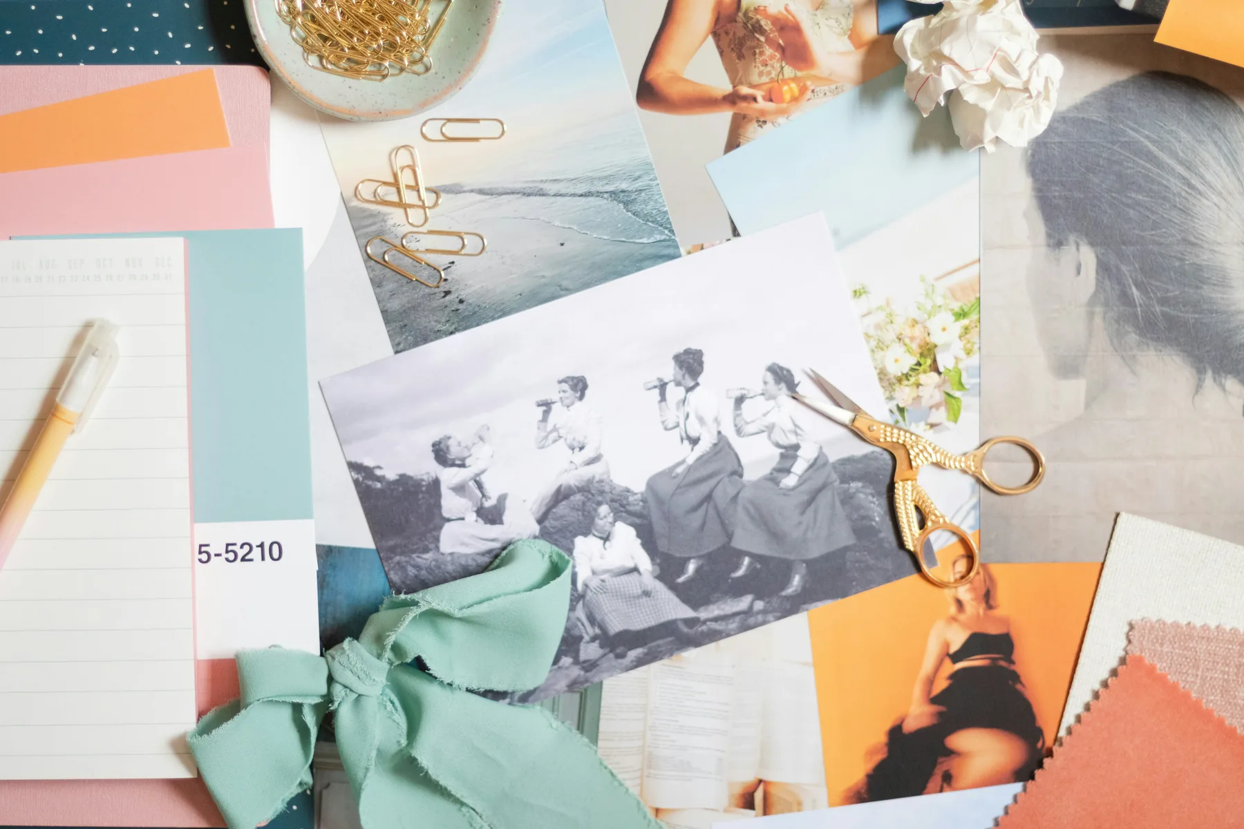 Editorial brand moodboard with photographs, paper and colour samples